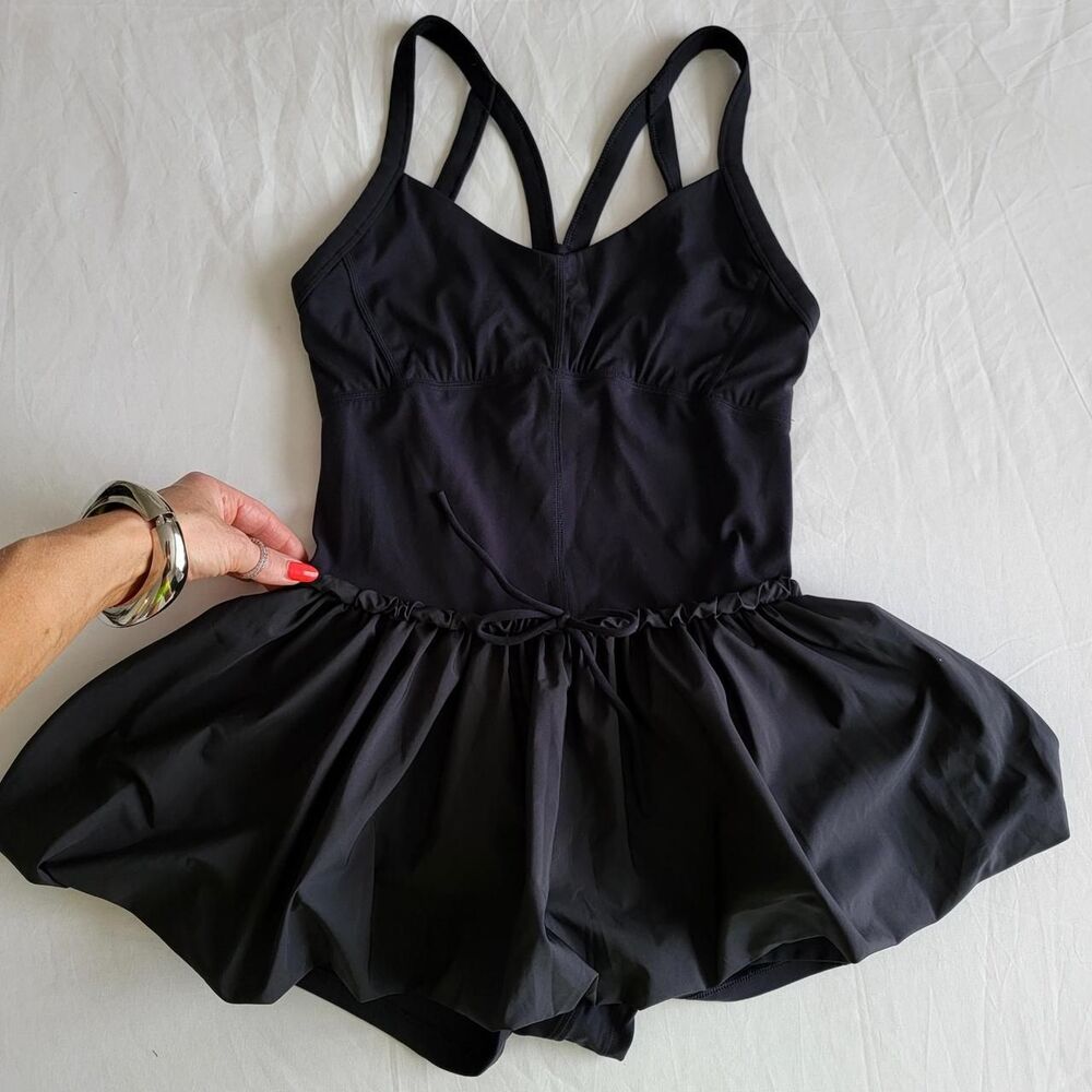 NWT FREE PEOPLE FP MOVEMENT Dance All Day Shortsie dress in black.